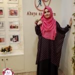 image of pink ball printed black cape