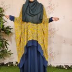 image of a woman wearing cape