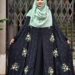 image of a woman wearing cape