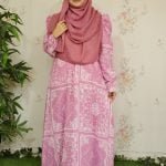 image of a woman wearing one part gown