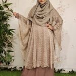 image of a woman wearing cape