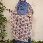 image of a woman wearing cape