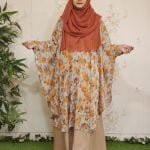 image of a woman wearing cape