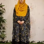 image of a woman wearing cape