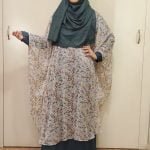 image of a woman wearing cape