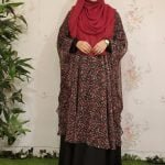 image of a woman wearing cape