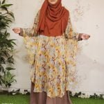 image of a woman wearing cape