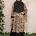 image of a woman wearing cape