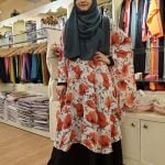 image of a woman wearing cape