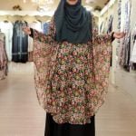 image of a woman wearing cape