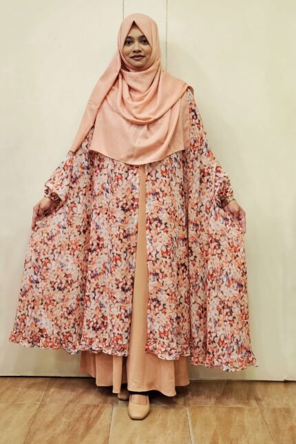Free size Cape.Semi-transparent soft georgette print. The bottom will be cut in front like a Khimar cape. There is a frill at the bottom.