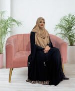 Women’s black cape in free size with elegant embroidery design.