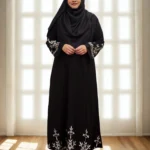 Elegant black borkha with white embroidery design made from soft BMW fabric