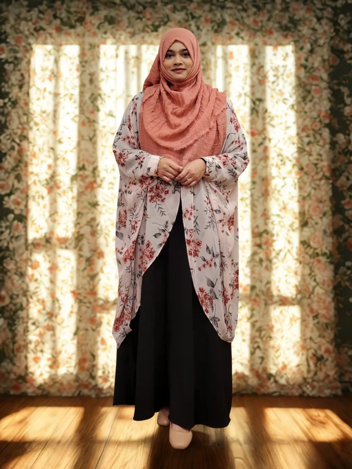 A lightweight, daily-wear cape with a locked side profile for a modest look
