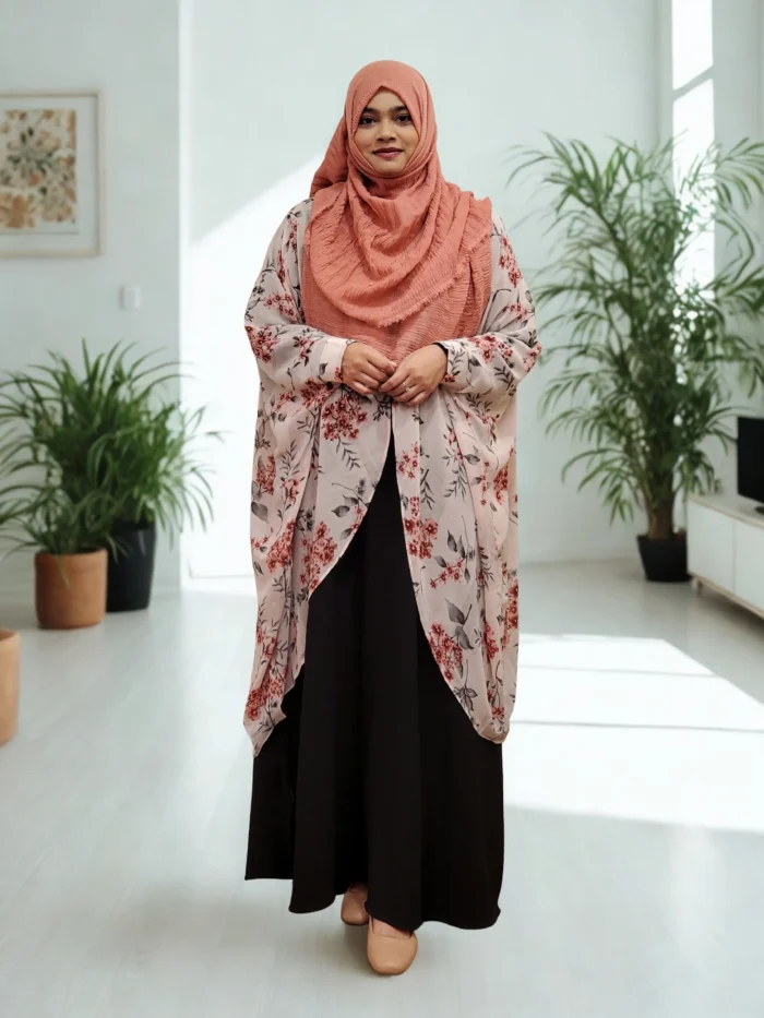 A lightweight, daily-wear cape with a locked side profile for a modest look