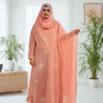 Elegant Korean crepe tissue gown with a diamond georgette inner layer, a veil, and a hijab.