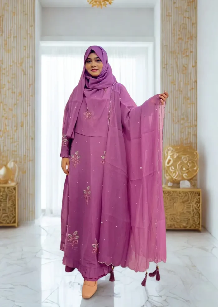 Elegant Korean crepe tissue gown with a diamond georgette inner layer, a veil, and a hijab.