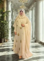 Stylish modest gown with matching veil and hijab in a high-quality fabric collection.