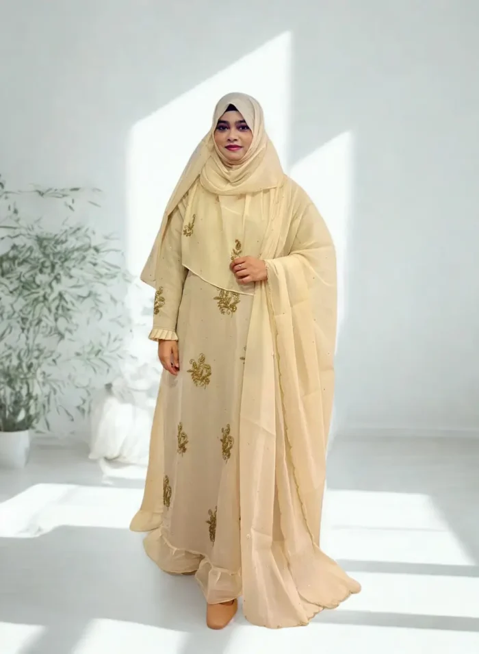 Stylish modest gown with matching veil and hijab in a high-quality fabric collection.