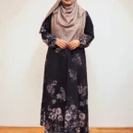 A new dress made of soft imported Dubai silk fabric borkha in one piece, showcasing prints all over—on top, bottom, and sleeves—made with a seamless single-cut technique and designed with elasticated sleeves for a snug, cool, summer-friendly fit.