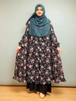 This new fusion cape is elegantly designed for women, made from soft transparent georgette material, with a front-open khimar-shaped design and frilled hem. This cape is made perfect for layering with kameez, inner, or saree.
