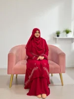 The combination of a maroon diamond georgette kimono, decorated with exquisite Karchupi and zardousi work, features a mermaid-style front cut, flaring sleeves, and stone embellishment.