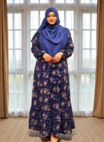 প্রিন্টের ডাবল পার্ট গাউন। ওয়ান কাটে বানানো। নিচে কুচি দিয়ে লং ফ্রিল দেয়া আছে। - Image 2